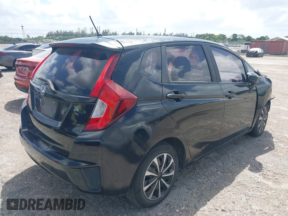 2016 Honda Fit LX with VIN JHMGK5H58GX002388, listed as a IAAI auction lot 41957350 with 127,211 mi miles. Bid and sale history available at carsss.com. Image 4.