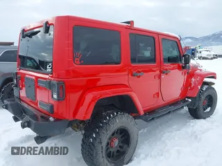 2015 Jeep Wrangler Unlimited Rubicon with VIN 1C4BJWFG7FL646463, listed as a IAAI auction lot 41537553 with 97,412 mi miles. Bid and sale history available at carsss.com. Image 4.