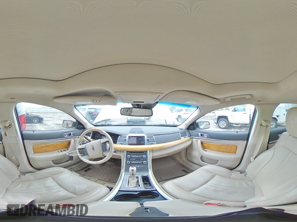 2011 Lincoln MKS z VIN 1LNHL9DR1BG608963, wystawiony jako Copart lot #55390335 z przebiegiem 162 383 mil mil oraz Szkoda całkowita • Salvage title. Historia ofert i sprzedaży dostępna na DreamBid. Obrazek 14.