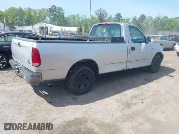 2002 Ford F-150 XL with VIN 1FTRF17202NB42616, listed as a IAAI auction lot 42117616 with 230,852 mi miles. Bid and sale history available at carsss.com. Image 4.