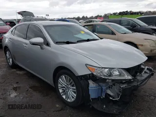 2013 Lexus ES 4dr Sdn with VIN JTHBK1GG1D2034954, listed as a IAAI auction lot 41720790 with 136,447 mi miles. Bid and sale history available at carsss.com. Image 13.