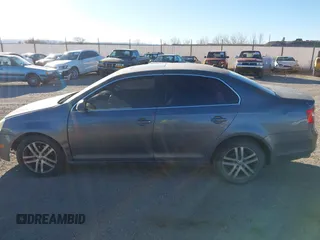 2005 Volkswagen Jetta 2.5L with VIN 3VWDF71K75M605160, listed as a IAAI auction lot 41624273 with 184,439 mi miles and . Bid and sale history available at DreamBid. Image 14.
