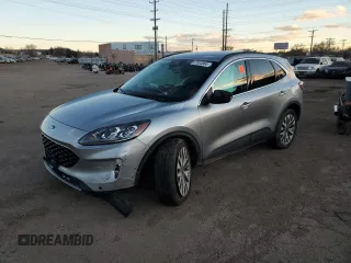 2021 Ford Escape Titanium with VIN 1FMCU9J97MUA70995, listed as a Copart auction lot 87004884 with Not Provided miles and Salvage Title. Bid and sale history available at carsss.com. Image 1.