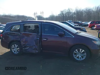 2014 Honda Odyssey EX-L with VIN 5FNRL5H60EB009083, listed as a IAAI auction lot 41633419 with 219,930 mi miles and . Bid and sale history available at carsss.com. Image 17.