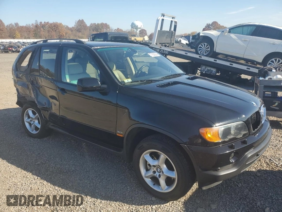2003 BMW X5 3.0i with VIN 5UXFA53563LV96891, listed as a Copart auction lot 77636084 with 0 mi miles and Salvage Title. Bid and sale history available at carsss.com. Image 4.