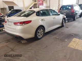2016 Kia Optima LX with VIN 5XXGT4L31GG046321, listed as a IAAI auction lot 41847730 with 88,439 mi miles. Bid and sale history available at carsss.com. Image 4.