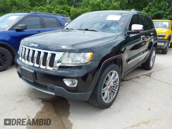 2013 Jeep Grand Cherokee Overland with VIN 1C4RJECT2DC588124, listed as a IAAI auction lot 42142573 with 204,309 mi miles and . Bid and sale history available at DreamBid. Image 17.