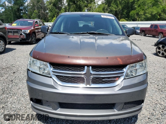 2013 Dodge Journey American Value with VIN 3C4PDCAB8DT566999, listed as a Copart auction lot 61361315 with 183,897 mi miles and Salvage title. Bid and sale history available at DreamBid. Image 5.