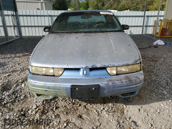 1994 Oldsmobile Cutlass z VIN 1G3WH55M1RD353266, wystawiony jako Copart lot #74058544 z przebiegiem 157 494 mil mil oraz Szkody całkowita. Historia ofert i sprzedaży dostępna na DreamBid. Obrazek 5.