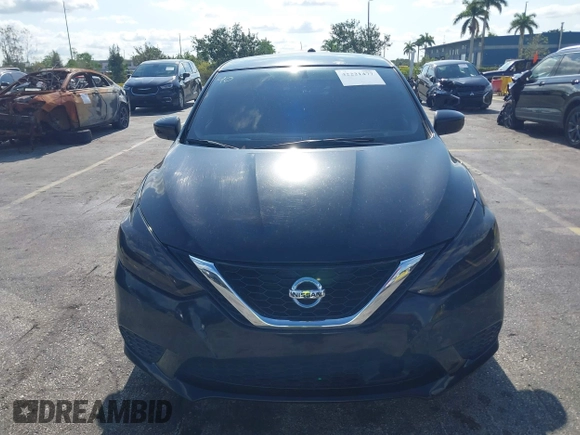 2018 Nissan Sentra S with VIN 3N1AB7AP2JY326055, listed as a IAAI auction lot 42221477 with 123,570 mi miles and . Bid and sale history available at DreamBid. Image 6.