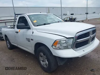 2019 Ram 1500 Classic Tradesman with VIN 3C6JR6DT8KG506165, listed as a IAAI auction lot 40721848 with 323,427 mi miles. Bid and sale history available at carsss.com. Image 1.