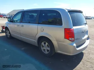 2011 Dodge Grand Caravan Mainstreet with VIN 2D4RN3DG0BR790008, listed as a IAAI auction lot 41701154 with 117,971 mi miles. Bid and sale history available at carsss.com. Image 3.