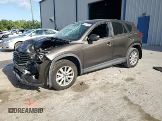 2016 Mazda CX-5 Sport with VIN JM3KE2BY5G0662568, listed as a Copart auction lot 51613115 with 0 mi miles and Non Repairable. Bid and sale history available at carsss.com. Image 1.