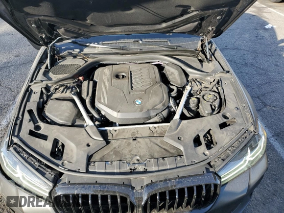 2023 BMW 5 Series 540i z VIN WBA53BJ0XPWX85901, wystawiony jako Copart lot #85325094 z przebiegiem 58 372 mil mil oraz Szkoda całkowita • Salvage title. Historia ofert i sprzedaży dostępna na DreamBid. Obrazek 11.