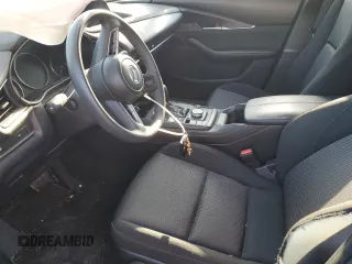2023 Mazda CX-30 S with VIN 3MVDMBAM1PM566211, listed as a Copart auction lot 52549525 with 36,382 mi miles and Salvage title. Bid and sale history available at DreamBid. Image 7.