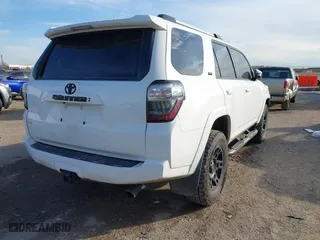 2022 Toyota 4Runner SR5 Premium with VIN JTENU5JR2N5990806, listed as a IAAI auction lot 41012517 with 67,029 mi miles. Bid and sale history available at carsss.com. Image 4.