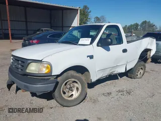 2003 Ford F-150 XL with VIN 2FTRF17W03CA59388, listed as a IAAI auction lot 41673651 with 221,668 mi miles. Bid and sale history available at carsss.com. Image 2.