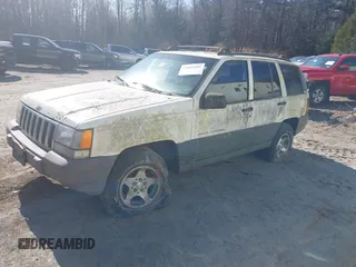 1996 Jeep Grand Cherokee Laredo with VIN 1J4GZ58Y7TC381600, listed as a IAAI auction lot 42065681 with 1 mi miles. Bid and sale history available at carsss.com. Image 2.