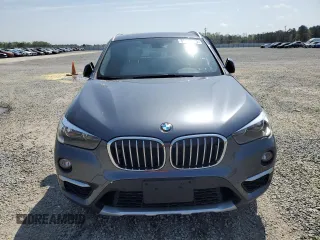 2018 BMW X1 xDrive28i with VIN WBXHT3C36J5L33585, listed as a Copart auction lot 51148545 with 32,091 mi miles and Salvage Title. Bid and sale history available at carsss.com. Image 5.