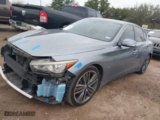 2014 Infiniti Q50 with VIN JN1BV7APXEM689997, listed as a IAAI auction lot 41614583 with 138,450 mi miles. Bid and sale history available at carsss.com. Image 18.