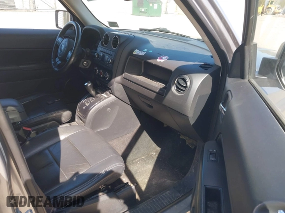2015 Jeep Patriot High Altitude with VIN 1C4NJRFB2FD168448, listed as a IAAI auction lot 42171207 with 158,846 mi miles and . Bid and sale history available at carsss.com. Image 5.