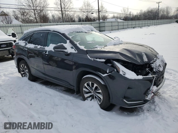 2021 Lexus RX with VIN 2T2AZMDA6MC289848, listed as a Copart auction lot 43322595 with 13,657 mi miles and Salvage Title. Bid and sale history available at carsss.com. Image 4.