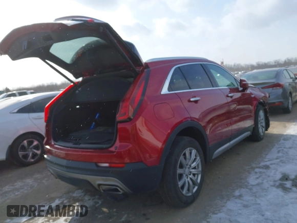 2021 Cadillac XT4 FWD Premium Luxury with VIN 1GYFZCR44MF019607, listed as a IAAI auction lot 41363064 with 24,364 mi miles. Bid and sale history available at carsss.com. Image 4.