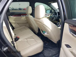 2019 Cadillac XT5 Luxury AWD with VIN 1GYKNDRS5KZ172975, listed as a IAAI auction lot 41814397 with 63,563 mi miles and . Bid and sale history available at carsss.com. Image 8.