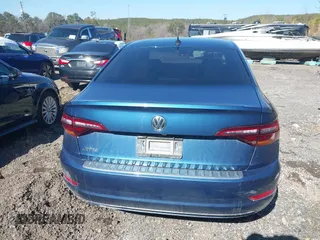 2019 Volkswagen Jetta SEL z VIN 3VWE57BU5KM163658, wystawiony jako IAAI lot #41488007 z przebiegiem 56 026 mil mil oraz . Historia ofert i sprzedaży dostępna na DreamBid. Obrazek 16.