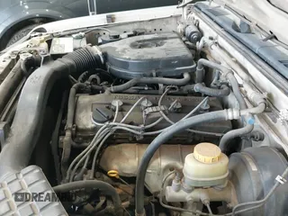 1998 Nissan Frontier XE with VIN 1N6DD21S9WC331083, listed as a IAAI auction lot 42202743 with 205,221 mi miles and . Bid and sale history available at DreamBid. Image 12.