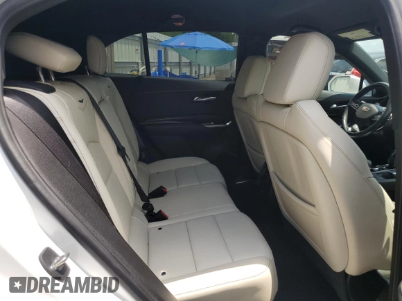 2019 Cadillac XT4 FWD Sport z VIN 1GYFZER47KF187301, wystawiony jako Copart lot #57715115 z przebiegiem 64 246 mil mil oraz Szkody całkowita. Historia ofert i sprzedaży dostępna na DreamBid. Obrazek 11.