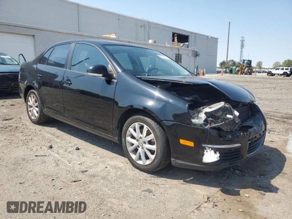2010 Volkswagen Jetta S with VIN 3VWJX7AJ0AM010023, listed as a Copart auction lot 52379285 with 124,881 mi miles and Salvage title. Bid and sale history available at DreamBid. Image 4.