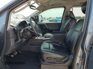 2011 Nissan Titan SL with VIN 1N6AA0EC4BN305296, listed as a Copart auction lot 59001395 with 194,557 mi miles and Salvage title. Bid and sale history available at DreamBid. Image 7.