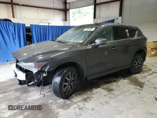 2018 Mazda CX-5 Grand Touring with VIN JM3KFBDM1J0440849, listed as a Copart auction lot 58354655 with 43,348 mi miles and Salvage title. Bid and sale history available at DreamBid. Image 1.