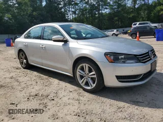 2014 Volkswagen Passat SE with VIN 1VWBT7A36EC047828, listed as a Copart auction lot 63711855 with 204,196 mi miles and Clean title. Bid and sale history available at DreamBid. Image 4.