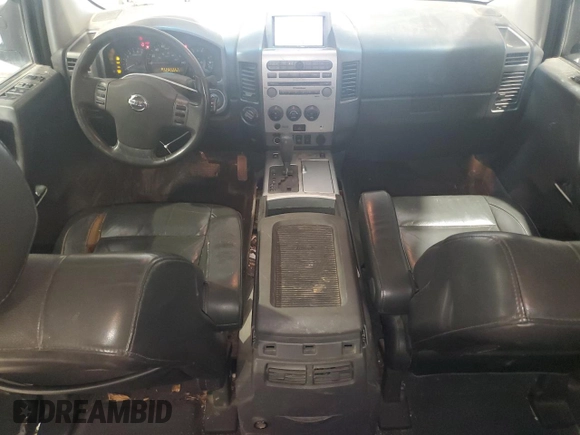 2007 Nissan Titan SE z VIN 1N6BA07B87N226908, wystawiony jako Copart lot #86951184 z przebiegiem 233 741 mil mil oraz Szkoda całkowita • Salvage title. Historia ofert i sprzedaży dostępna na DreamBid. Obrazek 8.