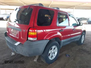 2006 Ford Escape XLT with VIN 1FMYU93126KB18365, listed as a IAAI auction lot 41889706 with 134,718 mi miles. Bid and sale history available at carsss.com. Image 4.