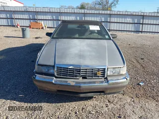 1992 Cadillac Seville z VIN 1G6EL13B2N0612154, wystawiony jako IAAI lot #41757101 z przebiegiem Nie podano mil oraz . Historia ofert i sprzedaży dostępna na DreamBid. Obrazek 14.