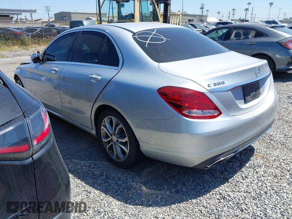 2015 Mercedes-Benz C 300 with VIN 55SWF4JB1FU077386, listed as a IAAI auction lot 42164280 with 104,452 mi miles and . Bid and sale history available at carsss.com. Image 3.