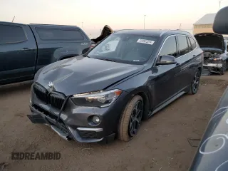 2018 BMW X1 xDrive28i with VIN WBXHT3C38J3H33310, listed as a Copart auction lot 73492324 with 88,620 mi miles and Salvage Title. Bid and sale history available at carsss.com. Image 1.