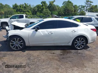 2015 Mazda 6 i Touring with VIN JM1GJ1V5XF1218908, listed as a IAAI auction lot 42449941 with Not provided miles and . Bid and sale history available at DreamBid. Image 13.