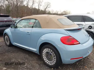 2015 Volkswagen Beetle 1.8T w/Tech with VIN 3VW517AT9FM802294, listed as a IAAI auction lot 41516005 with 110,184 mi miles and . Bid and sale history available at DreamBid. Image 14.