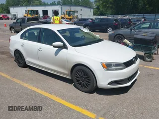 2014 Volkswagen Jetta SE with VIN 3VWD07AJ8EM296243, listed as a IAAI auction lot 42754554 with 149,717 mi miles and . Bid and sale history available at DreamBid. Image 1.