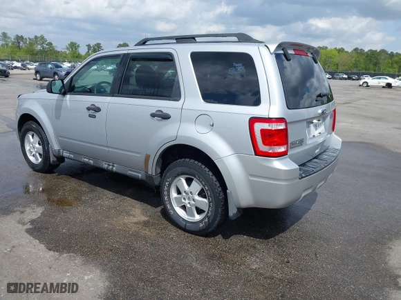 2011 Ford Escape XLT with VIN 1FMCU9D73BKB26014, listed as a IAAI auction lot 41954987 with 156,433 mi miles. Bid and sale history available at carsss.com. Image 3.