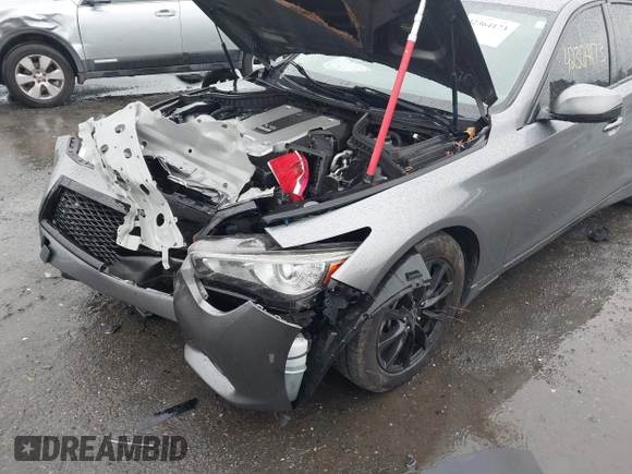 2015 Infiniti Q50 Premium with VIN JN1BV7APXFM358127, listed as a IAAI auction lot 42364173 with 97,512 mi miles and . Bid and sale history available at DreamBid. Image 6.