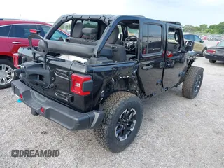 2024 Jeep Wrangler Rubicon X z VIN 1C4RJXR64RW197186, wystawiony jako IAAI lot #42405700 z przebiegiem 6 397 mil mil oraz . Historia ofert i sprzedaży dostępna na DreamBid. Obrazek 4.