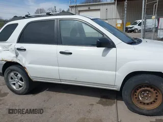 2009 Kia Sportage LX with VIN KNDJE723597560168, listed as a IAAI auction lot 41824779 with 110,386 mi miles. Bid and sale history available at carsss.com. Image 13.
