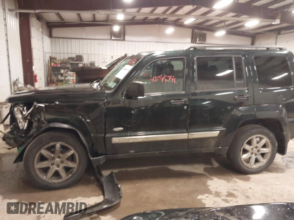 2012 Jeep Liberty Sport with VIN 1C4PJMAKXCW169544, listed as a IAAI auction lot 42045754 with 77,829 mi miles. Bid and sale history available at carsss.com. Image 14.
