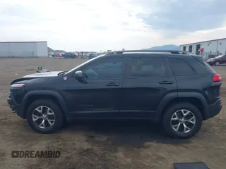 2016 Jeep Cherokee Trailhawk with VIN 1C4PJMBS4GW169267, listed as a IAAI auction lot 42597291 with 79,258 mi miles and . Bid and sale history available at DreamBid. Image 14.