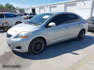 2009 Toyota Yaris with VIN JTDBT903891331057, listed as a IAAI auction lot 41849148 with 182,142 mi miles. Bid and sale history available at carsss.com. Image 17.
